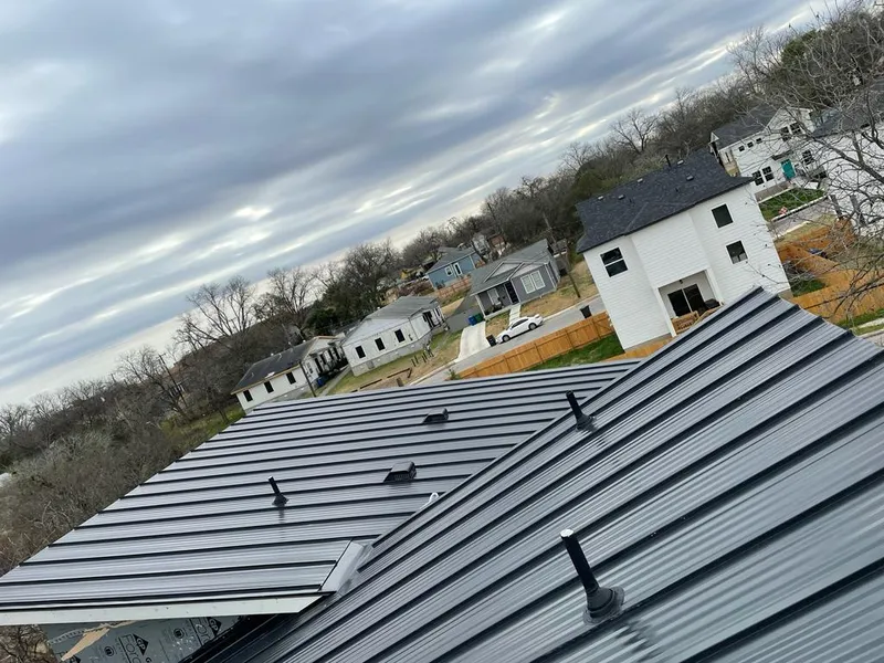 Standing seam metal roof panels with vents for Skylight Repair in Parsons